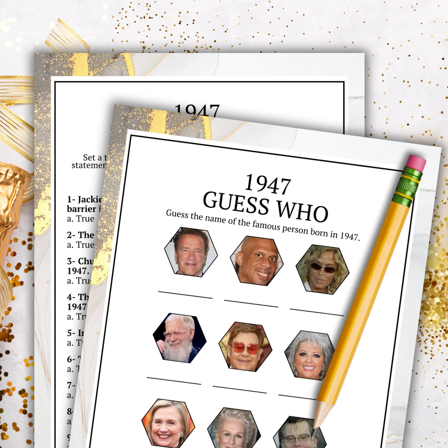 A printed worksheet titled '1947 GUESS WHO' with multiple portrait cutouts and a pencil, styled on top of another worksheet with gold confetti and decorative props.